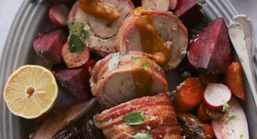 Bacon-wrapped porchetta with herbs recipe