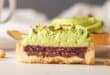 Creamy avocado and pistachio tart with cream cheesepeople talking after the first bite