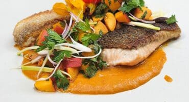 Sweet and tangy nectarine harissa salmon with fresh herb salsa