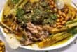 Slow-cooked lamb shoulder with preserved lemon and herbs