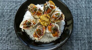 Baked oysters with lemon, herbs and crispy crumbs