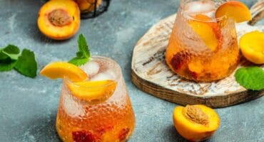 The peachy bourbon smash is made for relaxed Friday evenings