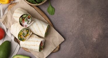 Roast veggies and avocado mayo wraps
