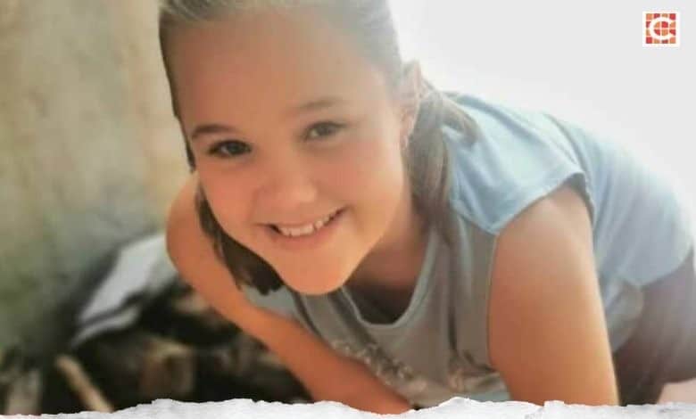 Close-up of young girl smiling at the camera