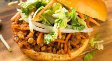 Homemade healthy vegan lentil barbecue sandwich with slaw
