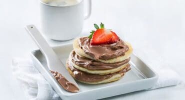 Flapjacks with chocolate spread and fresh berries