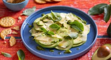 Avocado Carpaccio with basil pesto and white cheddar