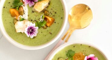 Chilled courgette soup with roasted tomatoes and fresh coriander