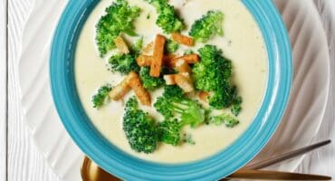 Creamy broccoli soup served with cheddar croutons