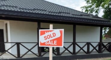 Buy the 'ugly' house on a great street?