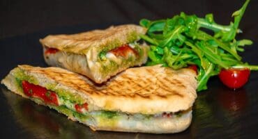 Mozzarella, tomato and pesto toasted panini