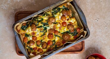 Frikkadel frittata with spinach, feta and baby tomatoes