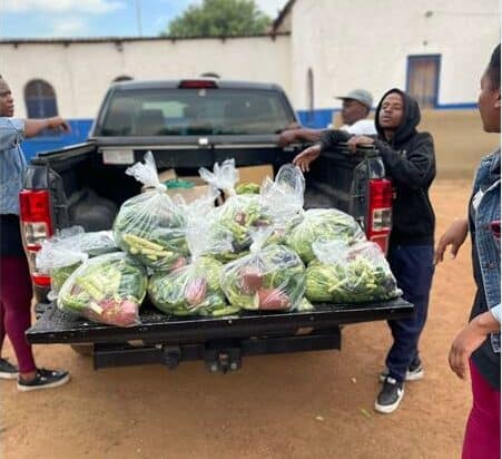 Annual car-spinning festival partners with local kitchen to support Pimville Zone 4 residents with food donations and community care.