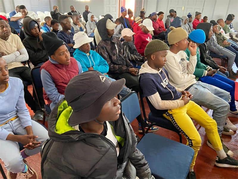 Lesego Mathye urges communities to come together to support boys and address their challenges.
