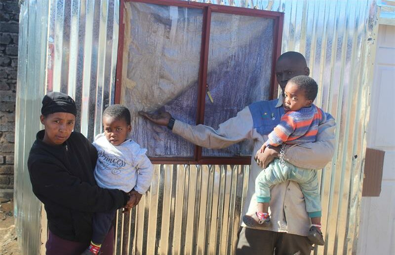 After a fire destroyed their homes, the Pienaar family in Eldorado Park received two new shacks from the Patriotic Alliance, but still face urgent needs for repairs, clothing, and essential documents.