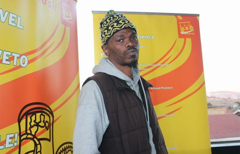 Driven by a love for music, Soweto-born Macebo Mdluli—known as Legendary OG—founded Do-Uproductionz to give rising hip-hop artists a platform. Despite funding challenges, his mixtapes and collaborations continue to uplift new talent in Orlando West and beyond.