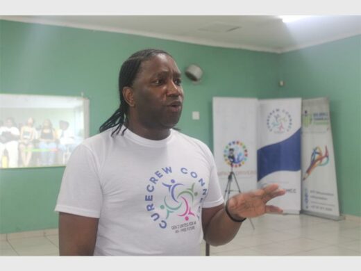 Empowerment speaker at Soweto community event promoting youth development and social inclusion.