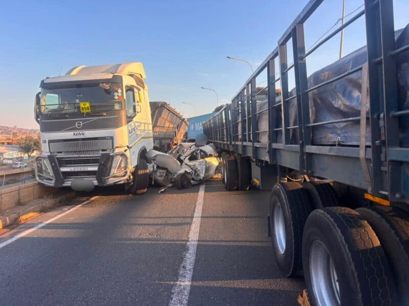 The crash involved two heavy-duty trucks and a light motor vehicle.