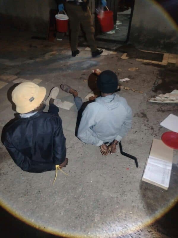 Two men were arrested after metro police uncovered a hijacked National Department of Health vehicle being stripped.