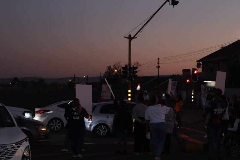 Residents have gathered at Turf Avenue to protest the death of Laurelle Mario and appeal to anyone with information to assist investigators.