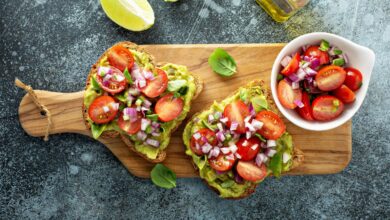 Fresh guacamole and tomato sandwich spread