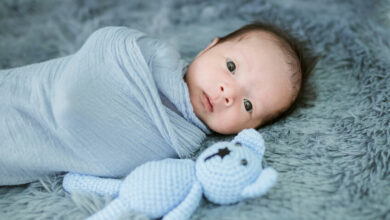 When to stop swaddling your baby