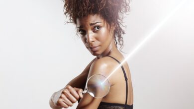 Woman,With,Lens,And,Ray,Of,Laser.,Spf,Concept,,Sun