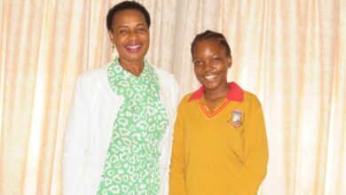 Tshembekile Mabunda with Principal Angel Machaba.