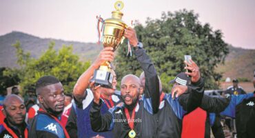 KCE celebrate their win. Photo Mave Pixels.