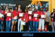 The Palabora Foundation robotics team stands on stage with their prizes.