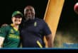 The Protea captain, and coach, smile for a picture. A cricket bat and ball are in the background.