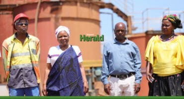 Mzamani Mdaka, Mayor Thandi Zitha in a Xitsonga traditiona; outfit, a member of the Shiviti royal family, and councillor Cony Manganyi at the Giyani Gold Mine.