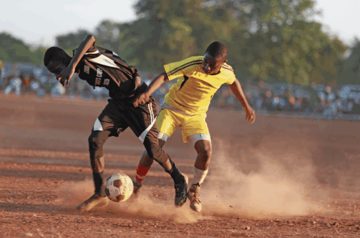 Two football players during a match.