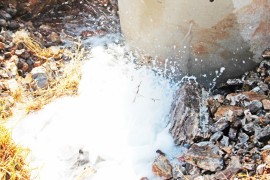 Water gushing from the huge valve.