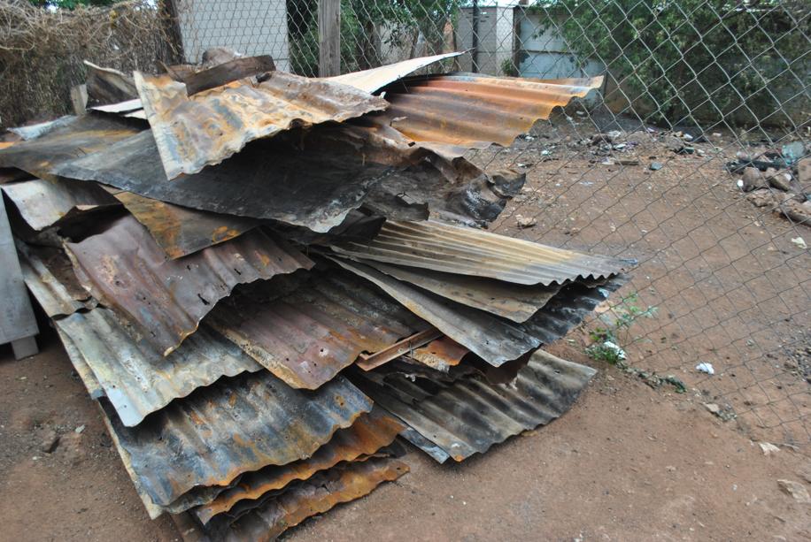 The destroyed zinc from the flames