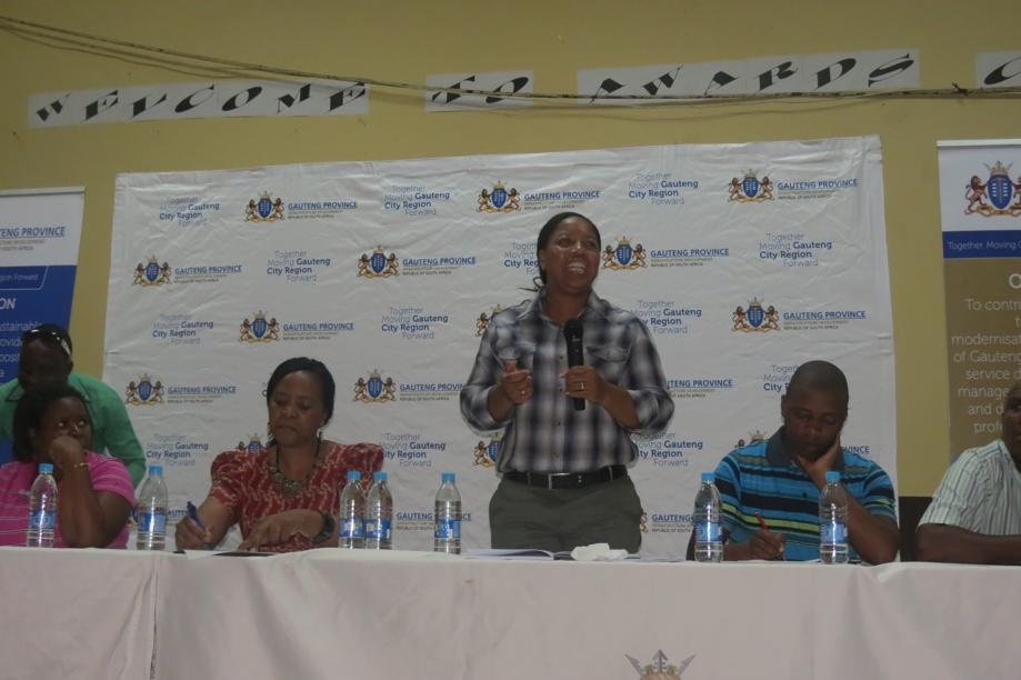 The Mayor, Ms Maphefo Mogale-Letsie, talking to the young people who attended the event. The MEC is sitting on her left in the photo