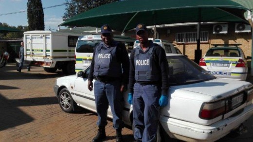 Const. Katlego Maleke and Sgt Steven Biko with the recovered Toyota.