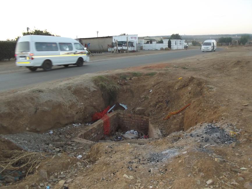 One of the hole dug by municipal contract workers left unattended