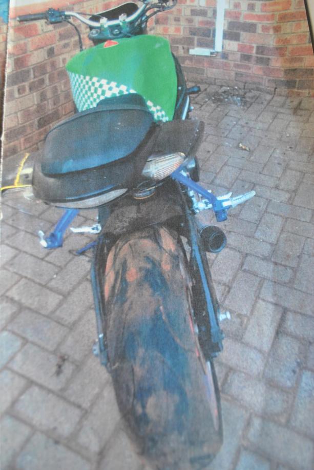 The green and black Suzuki motorbike