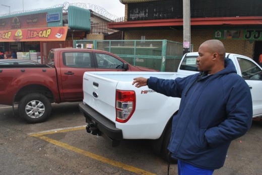 The-owners-of-the-grey-Tazz-Mr-Lucky-Sobhuwa-at-the-parking-on-Amethyst-Street-where-the-vehicle-was-stolen.
