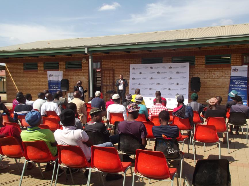 Veli Shongwe from the the Social Development talking to all the men during the meeting