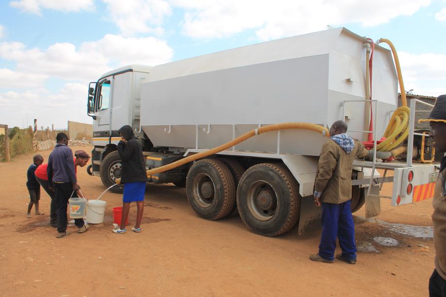 Kokosi residents getting water from a municipal tanker on Monday.