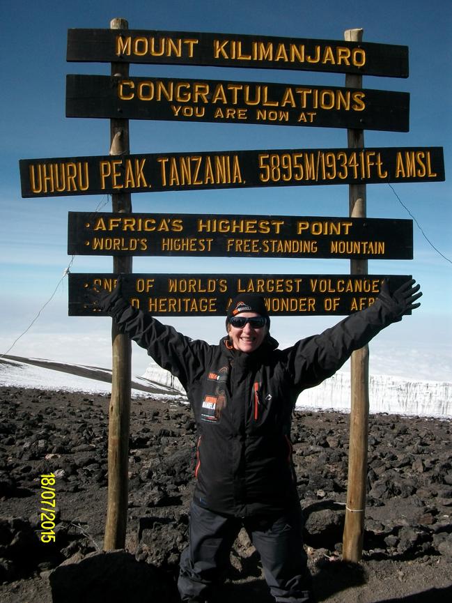 Schutte upon reaching the summit during last year's climb.