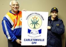 Dawie Harman (Carletonville CPF chairperson) with Brig. Marinda Theron (Station Commander)