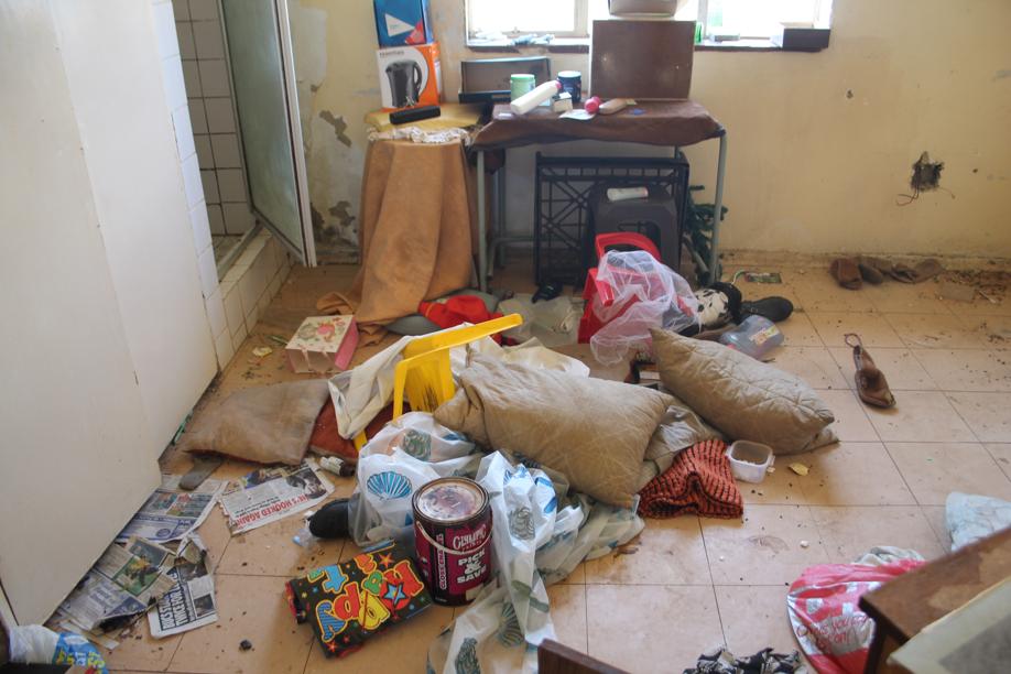 The state of one of the rooms in the hostel.