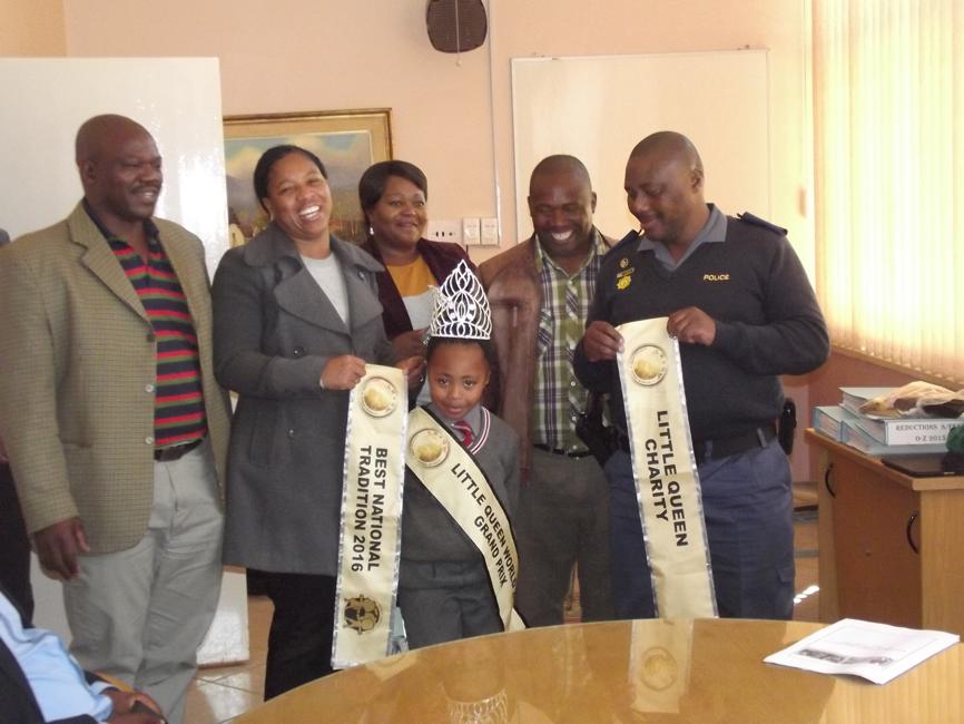 The mayor of Merafong, Maphefo LetsieMogale with officials and Noxolo's parents.