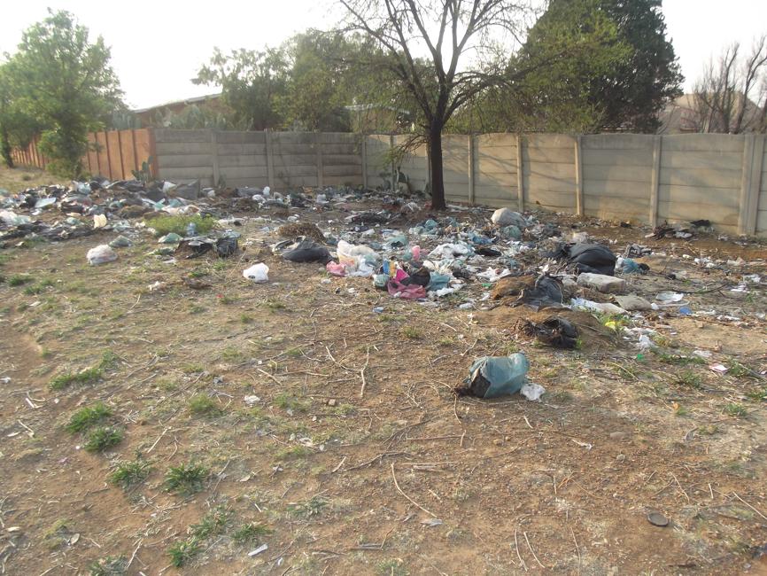 The view of the dumpsite in Munt Street from a distance.