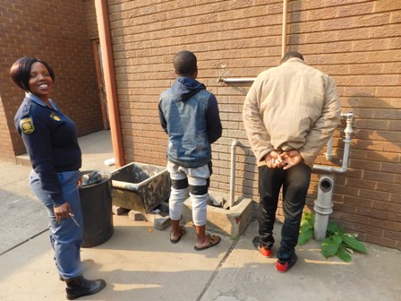 Two men have been arrested and charged with rape and human trafficking.