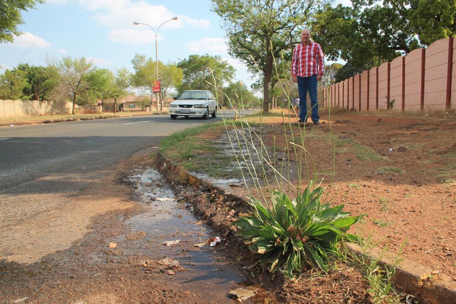 Mr Carlos Rebelo at a water leak in Onyx Drive.