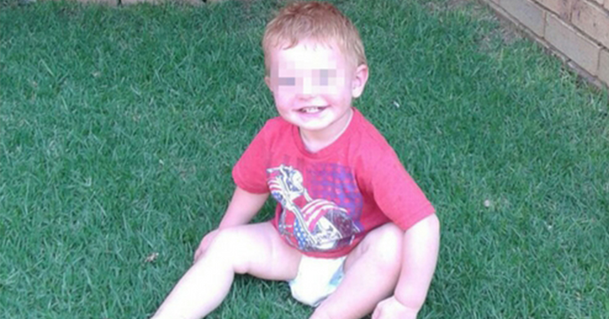 The little boy a week after his removal from his parents' home.